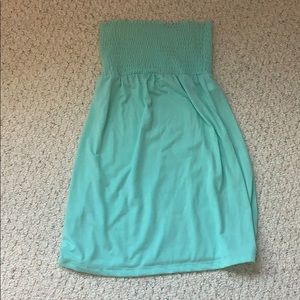 A turquoise girls strapless dress